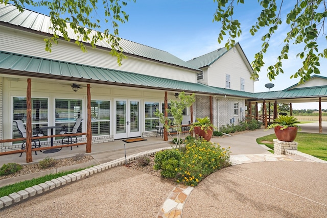 back of property featuring french doors and ceiling fan