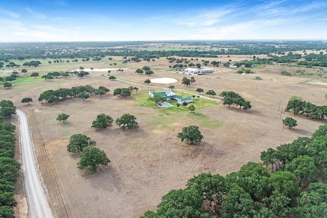 birds eye view of property featuring a rural view