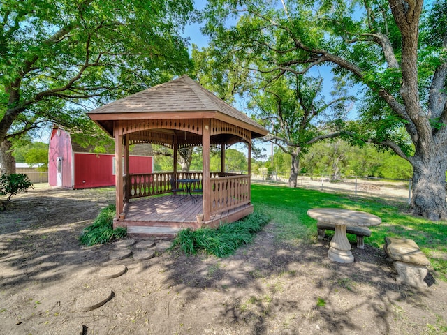 view of yard featuring a gazebo and a shed