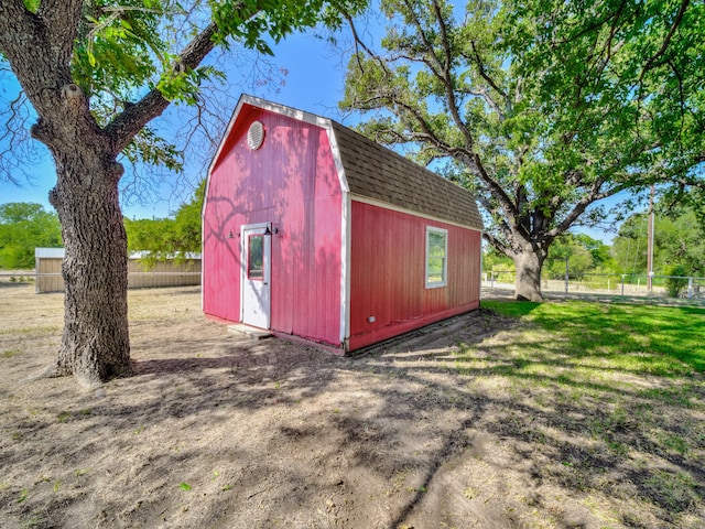 view of outdoor structure featuring a yard