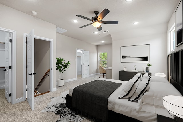 carpeted bedroom with ceiling fan