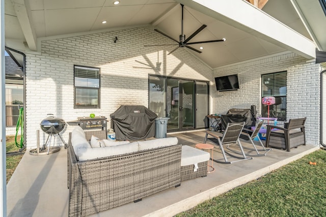 view of patio / terrace with ceiling fan, grilling area, and an outdoor living space