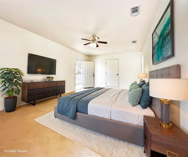 1215 Indiana St, Graham, TX 76450 - bedroom with carpet floors and a ceiling fan