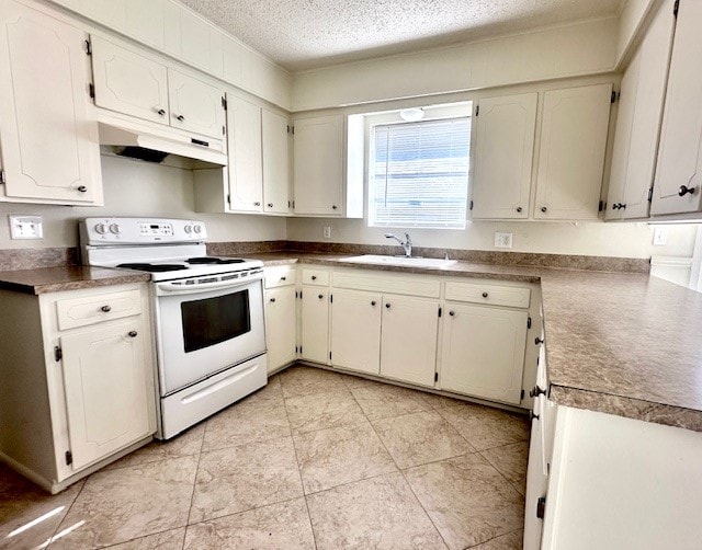 kitchen with light tile patterned flooring, a textured ceiling, sink, and white range with electric cooktop