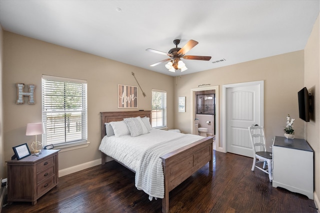 bedroom featuring ceiling fan, dark hardwood / wood-style flooring, and ensuite bathroom