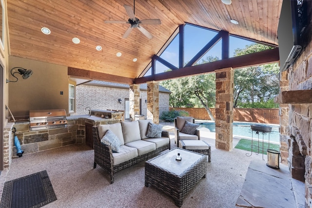 exterior space featuring a fenced in pool, a gazebo, an outdoor kitchen, a grill, and ceiling fan