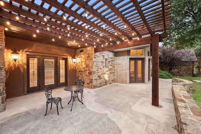 view of patio / terrace with a pergola and french doors