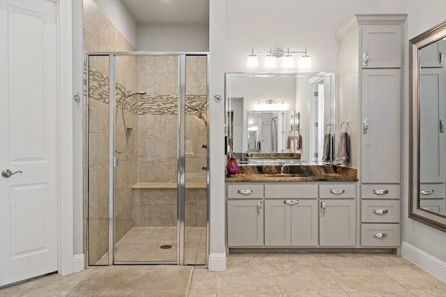 bathroom with vanity and an enclosed shower