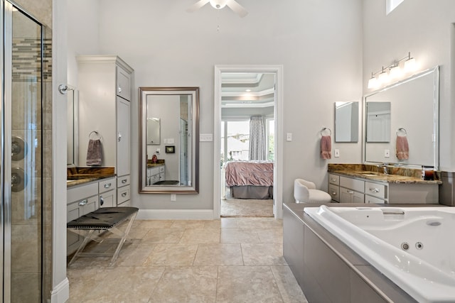 bathroom with ceiling fan, crown molding, tile patterned floors, plus walk in shower, and vanity