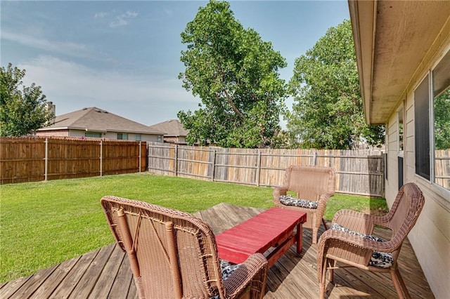 deck featuring a lawn