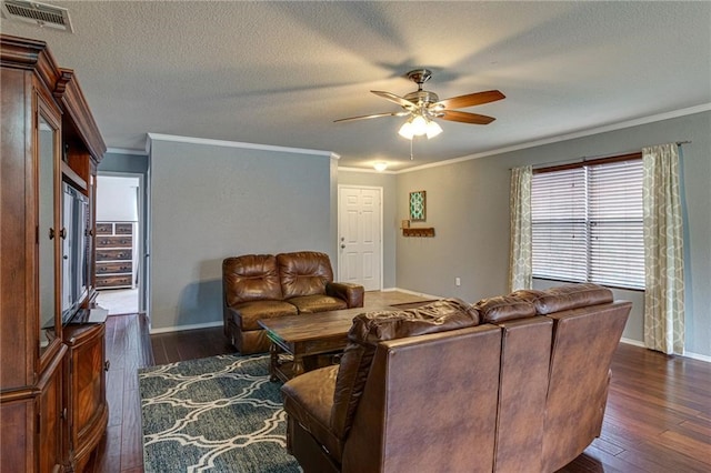 living room with ceiling fan, a textured ceiling, crown molding, and dark wood-type flooring