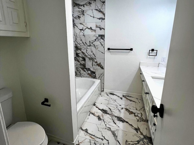 bathroom featuring tile patterned flooring, vanity, and toilet