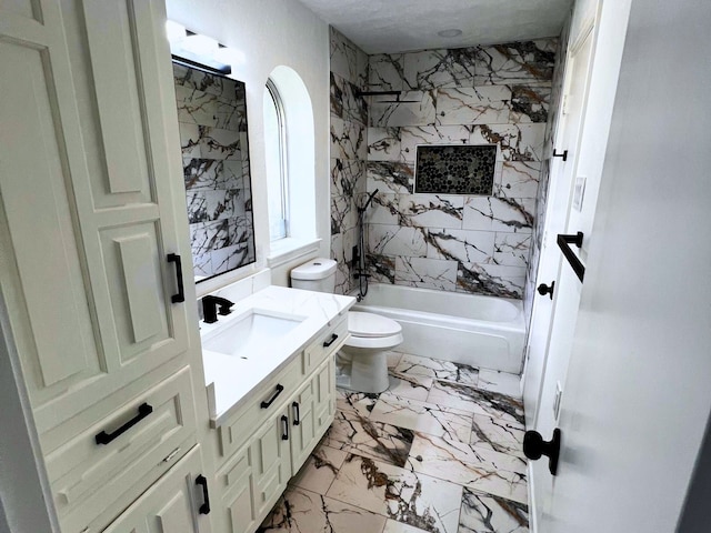 full bathroom with toilet, tiled shower / bath, vanity, and tile patterned floors