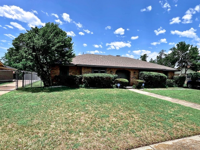 single story home with a front yard