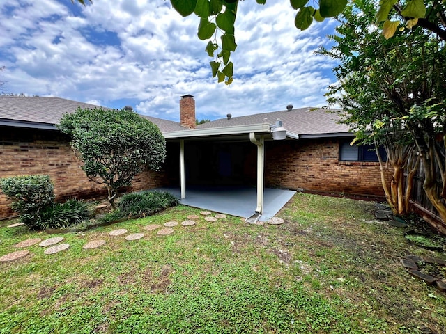 back of house featuring a patio