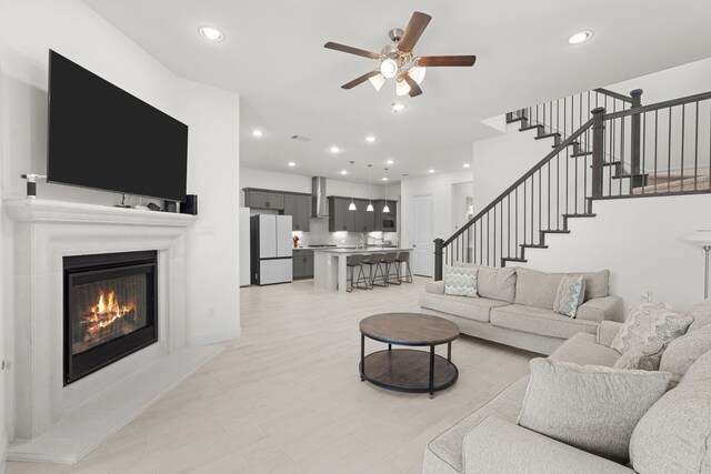 living room featuring ceiling fan