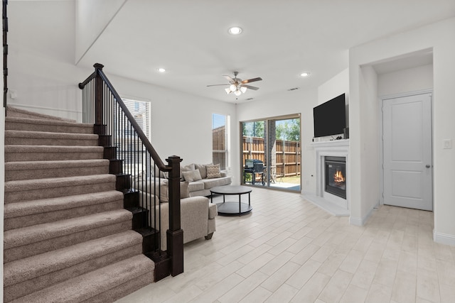 living room featuring ceiling fan