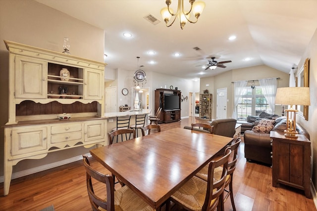 dining area featuring light wood-style flooring, visible vents, and recessed lighting