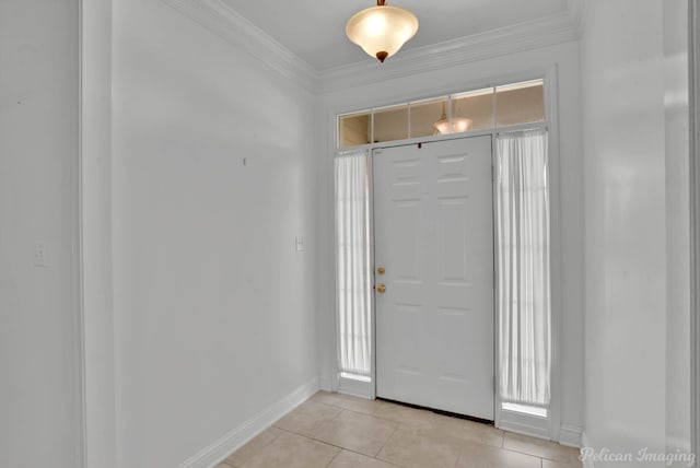 entrance foyer featuring light tile patterned floors and crown molding