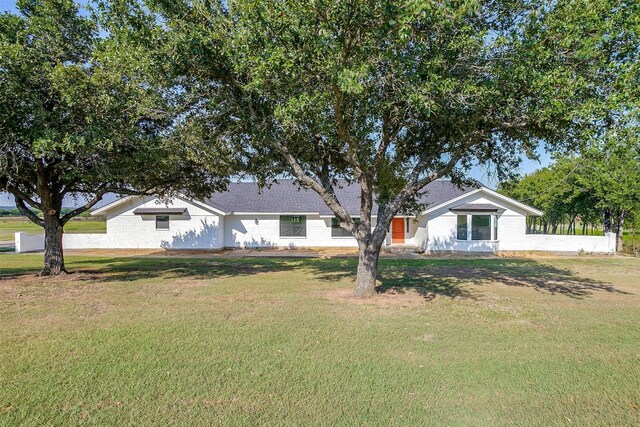 view of front of home with a front yard