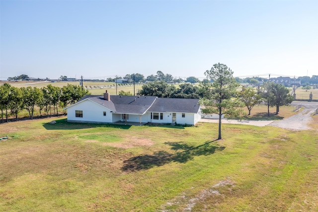 birds eye view of property featuring a rural view