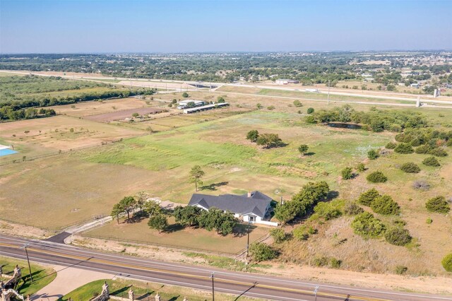 birds eye view of property featuring a rural view