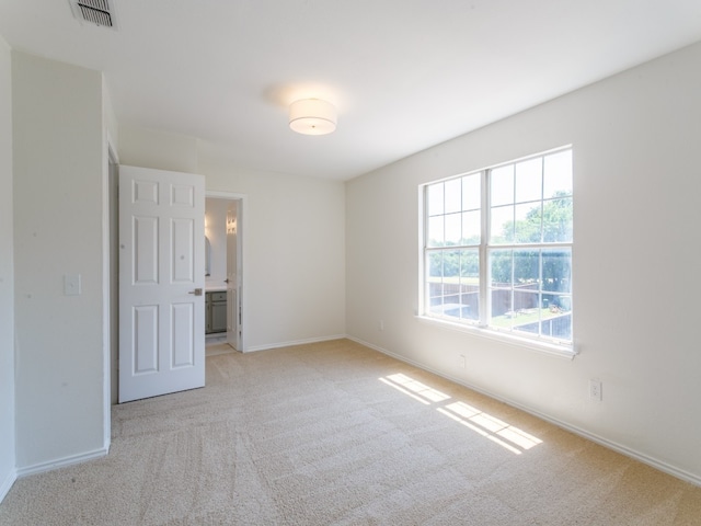 empty room with light carpet