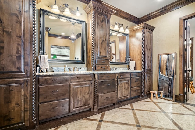 bathroom with tile patterned floors, ornamental molding, and vanity