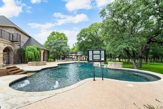 view of pool featuring pool water feature