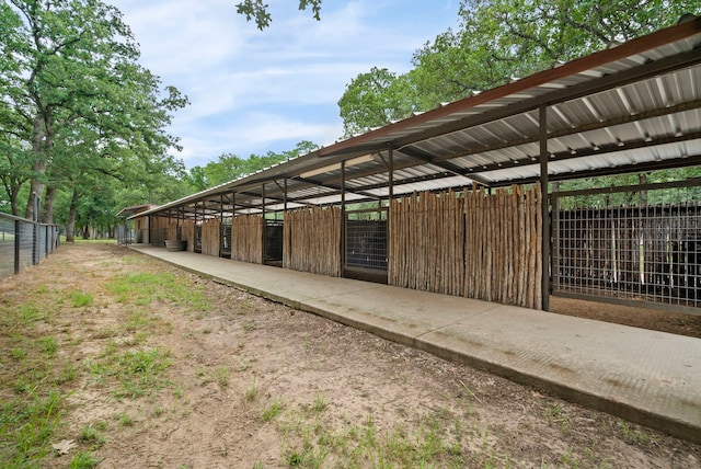 view of stable with an outbuilding