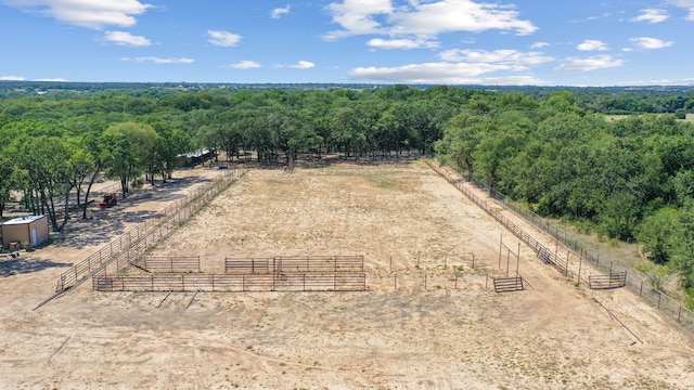 birds eye view of property featuring a rural view