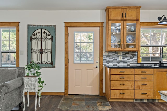 interior space with sink and dark wood-type flooring