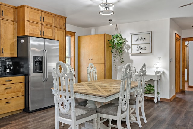 dining space with dark wood-type flooring