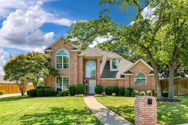 view of front property with a front lawn