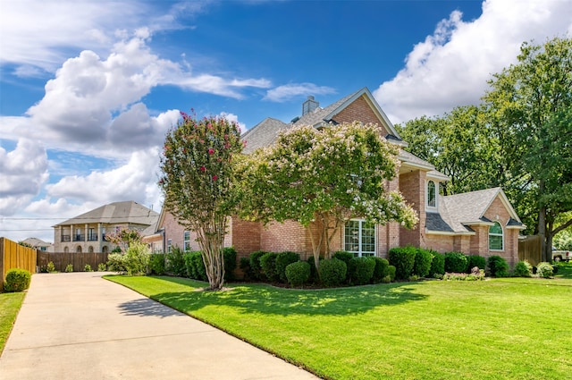 view of front of home with a front lawn