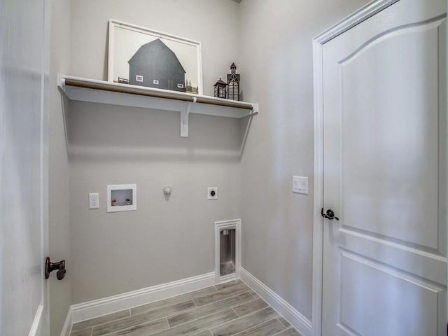 laundry room with hookup for a washing machine, gas dryer hookup, and hookup for an electric dryer