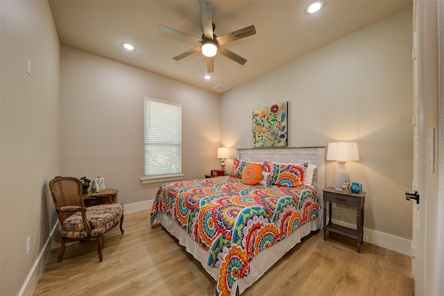 bedroom featuring ceiling fan and light wood-type flooring