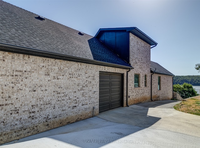 view of home's exterior with a garage