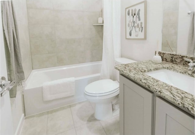 full bathroom with shower / bath combo, toilet, tile patterned floors, and vanity