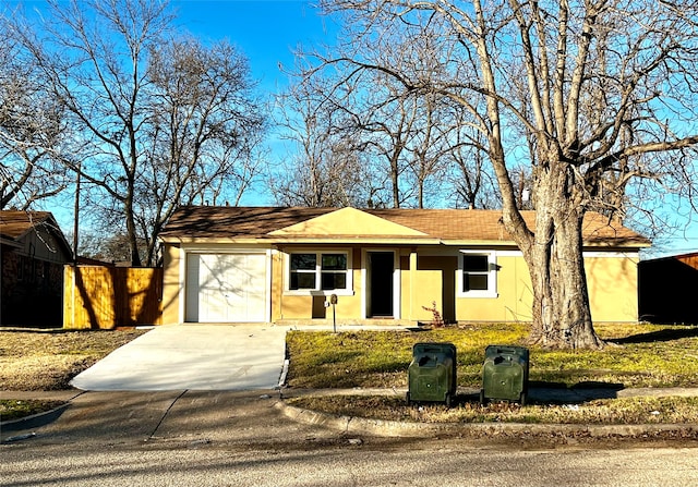 single story home with a garage