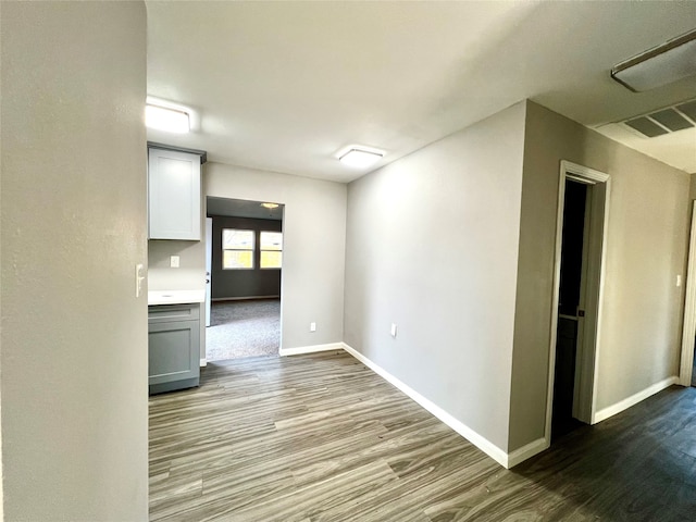 spare room with light hardwood / wood-style flooring