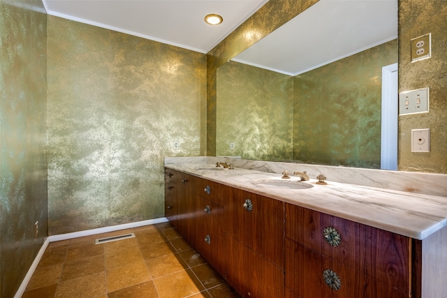 bathroom with tile patterned flooring and vanity