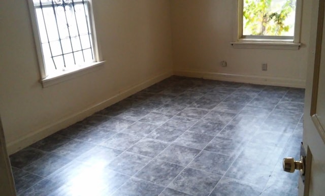 view of tiled spare room