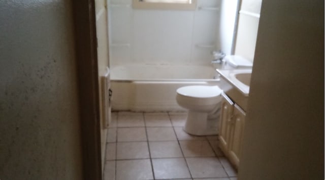 full bathroom with tile patterned flooring, vanity, bathing tub / shower combination, and toilet