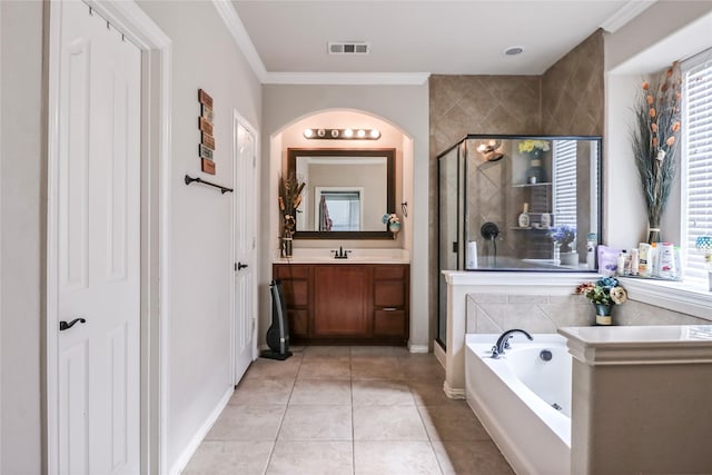 full bath with tile patterned flooring, visible vents, crown molding, a stall shower, and a bath