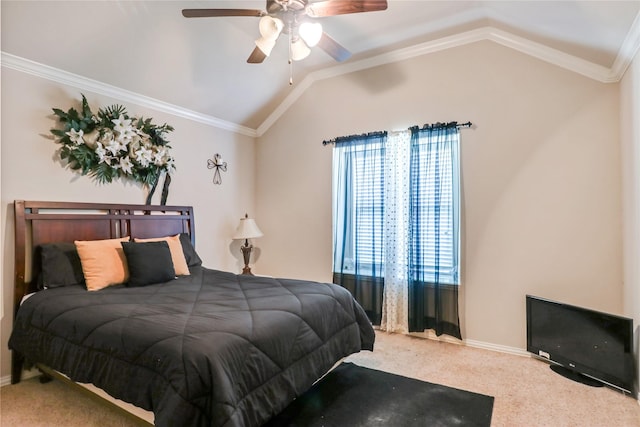 carpeted bedroom featuring ornamental molding, a ceiling fan, and vaulted ceiling