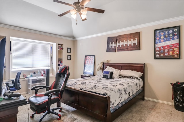 bedroom with a ceiling fan, carpet flooring, crown molding, baseboards, and vaulted ceiling