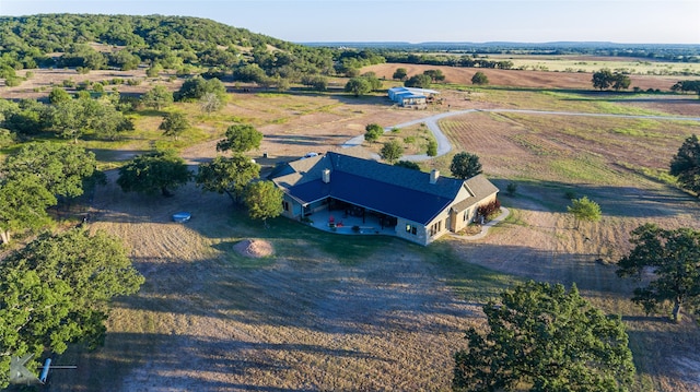 birds eye view of property featuring a rural view