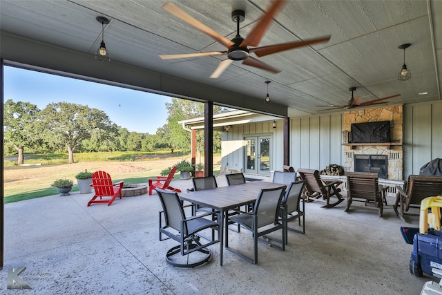 view of patio / terrace featuring ceiling fan