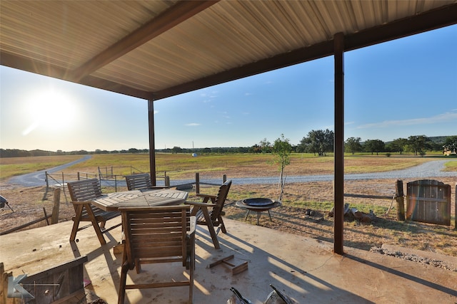 view of patio / terrace with a rural view